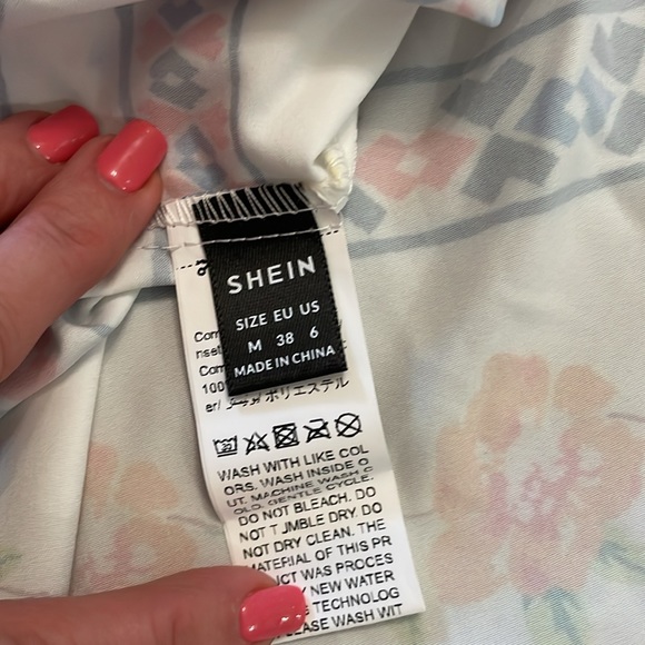 Never worn size medium long sundress. Criss cross adjustable straps in back - Picture 5 of 5